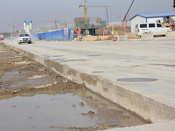 新疆伊犁建设兵团内部场地固废半钢性混凝土筑路